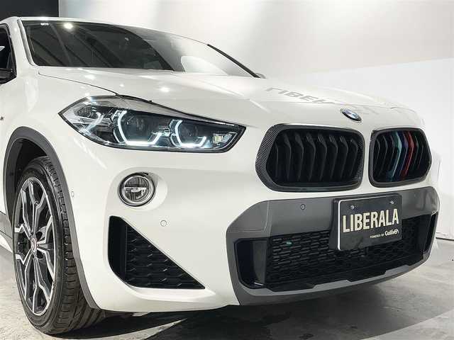 ＢＭＷ Ｘ２ xDrive 18d MスポーツX EDジョイ+ 道央・札幌 2020(令2)年 3.9万km アルピンホワイトⅢ コンフォートパッケージ/・オートマチックテールゲートオペレーション/・フロントシートヒーティング/アドバンスドアクティブセーフティパッケージ/・BMWヘッドアップディスプレイ/・ドライビングアシストプラス/・ACC/アクティブクルーズコントロール/電動フロントシート/ハーフレザーシート/スポーツシート(D/N)/パーキングアシスト/PDC/パークディスタンスコントロール/リアビューカメラ/ドライビングアシスト/・レーンディパーチャーウォーニング/・前車接近警告機能/衝突回避 被害軽減ブレーキ/MsportXエクステリアパッケージ/LEDヘッドライト/LEDフォグランプ/ライトパッケージ/・アンビエントライト/・フットウェルライト/コンフォートアクセス/レインセンサー/デュアルエキゾーストテールパイプ/MライトアロイホイールYスポークスタイリング19インチAW/Mスポーツレザーステアリングホイール/10.25インチワイドコントロールディスプレイ/ミラー一体型ETC/純正ドライブレコーダー