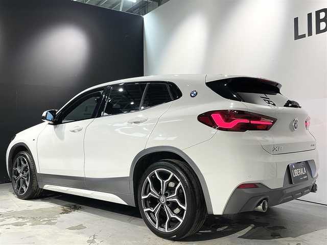 ＢＭＷ Ｘ２ xDrive 18d MスポーツX EDジョイ+ 道央・札幌 2020(令2)年 3.9万km アルピンホワイトⅢ コンフォートパッケージ/・オートマチックテールゲートオペレーション/・フロントシートヒーティング/アドバンスドアクティブセーフティパッケージ/・BMWヘッドアップディスプレイ/・ドライビングアシストプラス/・ACC/アクティブクルーズコントロール/電動フロントシート/ハーフレザーシート/スポーツシート(D/N)/パーキングアシスト/PDC/パークディスタンスコントロール/リアビューカメラ/ドライビングアシスト/・レーンディパーチャーウォーニング/・前車接近警告機能/衝突回避 被害軽減ブレーキ/MsportXエクステリアパッケージ/LEDヘッドライト/LEDフォグランプ/ライトパッケージ/・アンビエントライト/・フットウェルライト/コンフォートアクセス/レインセンサー/デュアルエキゾーストテールパイプ/MライトアロイホイールYスポークスタイリング19インチAW/Mスポーツレザーステアリングホイール/10.25インチワイドコントロールディスプレイ/ミラー一体型ETC/純正ドライブレコーダー