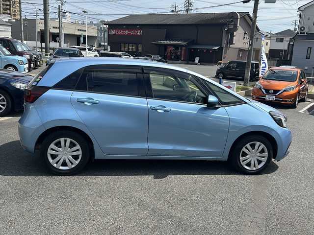 ホンダ フィット e:HEVホーム 愛知県 2020(令2)年 9.9万km ライトブルー (株)IDOMが運営する【じしゃロン名古屋鳴海店】の自社ローン専用車両になりますこちらは現金またはオートローンご利用時の価格です。自社ローンご希望の方は別途その旨お申付け下さい/禁煙車/ホンダセンシング/純正9型ナビTV/（VXU-205FTi/CD/DVD/MSV/Bluetooth/フルセグTV)/純正バックカメラ/純正LEDオートライト/純正フロアマット/アダプティブクルーズコントロール/レーンディパーチャーアラート/クリアランスソナー/電子パーキング/オートホールド/ウインカードアミラー/本革巻ハンドル/オートエアコン/スマートキー/プッシュエンジンスタート/新車時保証書/取扱い説明書