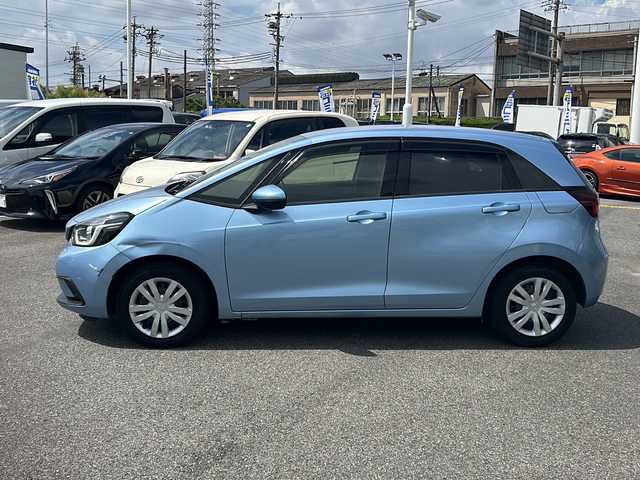 ホンダ フィット e:HEVホーム 愛知県 2020(令2)年 9.9万km ライトブルー (株)IDOMが運営する【じしゃロン名古屋鳴海店】の自社ローン専用車両になりますこちらは現金またはオートローンご利用時の価格です。自社ローンご希望の方は別途その旨お申付け下さい/禁煙車/ホンダセンシング/純正9型ナビTV/（VXU-205FTi/CD/DVD/MSV/Bluetooth/フルセグTV)/純正バックカメラ/純正LEDオートライト/純正フロアマット/アダプティブクルーズコントロール/レーンディパーチャーアラート/クリアランスソナー/電子パーキング/オートホールド/ウインカードアミラー/本革巻ハンドル/オートエアコン/スマートキー/プッシュエンジンスタート/新車時保証書/取扱い説明書