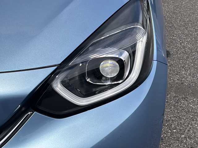 ホンダ フィット e:HEVホーム 愛知県 2020(令2)年 9.9万km ライトブルー (株)IDOMが運営する【じしゃロン名古屋鳴海店】の自社ローン専用車両になりますこちらは現金またはオートローンご利用時の価格です。自社ローンご希望の方は別途その旨お申付け下さい/禁煙車/ホンダセンシング/純正9型ナビTV/（VXU-205FTi/CD/DVD/MSV/Bluetooth/フルセグTV)/純正バックカメラ/純正LEDオートライト/純正フロアマット/アダプティブクルーズコントロール/レーンディパーチャーアラート/クリアランスソナー/電子パーキング/オートホールド/ウインカードアミラー/本革巻ハンドル/オートエアコン/スマートキー/プッシュエンジンスタート/新車時保証書/取扱い説明書