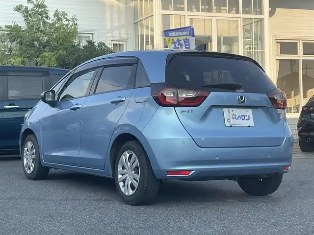 ホンダ フィット e:HEVホーム 愛知県 2020(令2)年 9.9万km ライトブルー (株)IDOMが運営する【じしゃロン名古屋鳴海店】の自社ローン専用車両になりますこちらは現金またはオートローンご利用時の価格です。自社ローンご希望の方は別途その旨お申付け下さい/禁煙車/ホンダセンシング/純正9型ナビTV/（VXU-205FTi/CD/DVD/MSV/Bluetooth/フルセグTV)/純正バックカメラ/純正LEDオートライト/純正フロアマット/アダプティブクルーズコントロール/レーンディパーチャーアラート/クリアランスソナー/電子パーキング/オートホールド/ウインカードアミラー/本革巻ハンドル/オートエアコン/スマートキー/プッシュエンジンスタート/新車時保証書/取扱い説明書