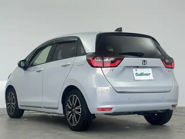 ホンダ フィット e:HEVリュクス 愛知県 2020(令2)年 2.5万km プレミアムサンライトホワイトパール ワンオーナー/ホンダセンシング/Gathers9インチナビ/バックカメラ/ハーフレザー/シートヒート/ステアリングヒーター/ドライブレコーダー/ACC/ドアバイザー/純正フロアマット/純正LEDライト/DVD再生可能/純正AW/USB端子入力