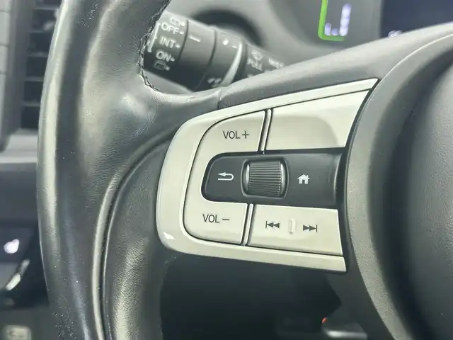 ホンダ フィット e:HEVリュクス 愛知県 2020(令2)年 2.5万km プレミアムサンライトホワイトパール ワンオーナー/ホンダセンシング/Gathers9インチナビ/バックカメラ/ハーフレザー/シートヒート/ステアリングヒーター/ドライブレコーダー/ACC/ドアバイザー/純正フロアマット/純正LEDライト/DVD再生可能/純正AW/USB端子入力