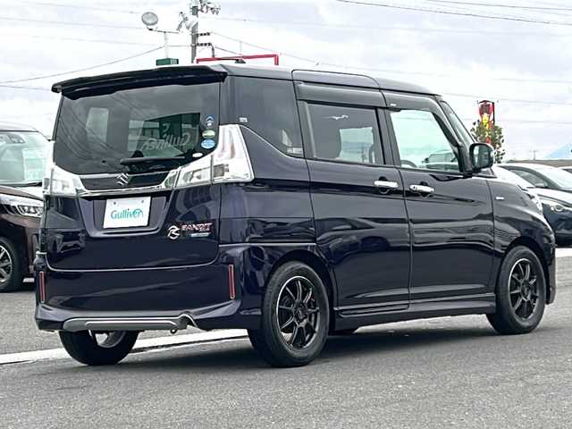 スズキ ソリオ 香川県 2015(平27)年 4.2万km ミッドナイトバイオレットメタリック 両側パワースライドドア/デュアルカメラブレーキサポート/純正７インチナビ(CN-R302WZ)/・フルセグTV/・CD/DVD/・Bluetooth/・バックカメラ/クルーズコントロール/シートヒーター(運転席)/LEDヘッドライト/社外15インチアルミホイール(CROSS SPEAD)/純正フロアマット/アイドリングストップ/プッシュスタート/ドライブレコーダー/ETC/スペアキー