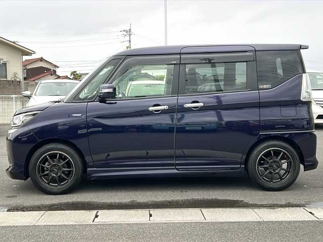 スズキ ソリオ 香川県 2015(平27)年 4.2万km ミッドナイトバイオレットメタリック 両側パワースライドドア/デュアルカメラブレーキサポート/純正７インチナビ(CN-R302WZ)/・フルセグTV/・CD/DVD/・Bluetooth/・バックカメラ/クルーズコントロール/シートヒーター(運転席)/LEDヘッドライト/社外15インチアルミホイール(CROSS SPEAD)/純正フロアマット/アイドリングストップ/プッシュスタート/ドライブレコーダー/ETC/スペアキー