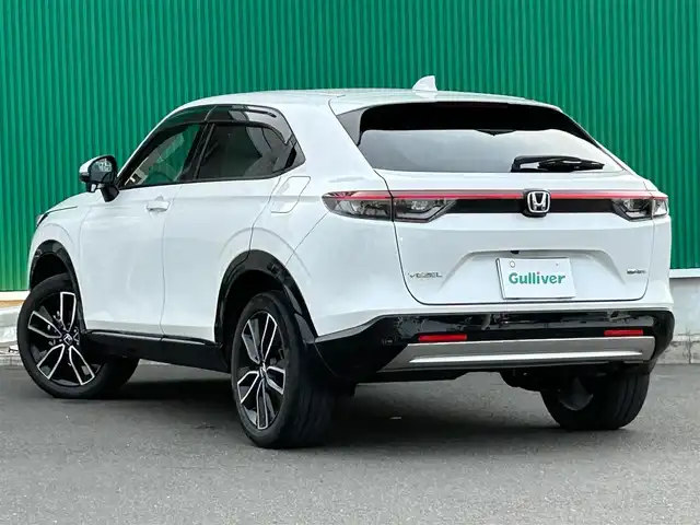 ホンダ ヴェゼル ハイブリッド e:HEV Z 宮城県 2022(令4)年 5.5万km プラチナホワイトパール Honda CONNECTディスプレー/・9インチワイドディスプレイ/・ナビ機能/・Bluetooth/・フルセグTV/＋ETC2.0車載器＋ワイヤレス充電器/後退出庫サポート/＝＝＝/ホンダセンシング/・衝突軽減ブレーキ/・誤発進抑制機能/・後方誤発進抑制機能/・近距離衝突軽減ブレーキ/・歩行者事故軽減ステアリング/・路外逸脱抑制機能/・渋滞追従機能付アダプティブクルーズコントロール/・車線維持支援システム/・先行車発進お知らせ機能/・標識認識機能/・オートハイビーム/・パーキングセンサーシステム/ブラインドスポットインフォメーション/ハンズフリーアクセスパワーテールゲート(予約クローズ機能付)/ハーフレザーシート/親水/ヒーテッドドアミラー/＋熱線入りフロントウインドウ/＋運転席助手席シートヒーター/LEDヘッドランプ/LEDシーケンシャルターンランプ/フォグランプ/電動パーキングブレーキ/ブレーキホールド/スマートキー＆プッシュスタート/純正18インチAW/フロアマット/ドアバイザー/W/サイド/カーテンエアバッグ