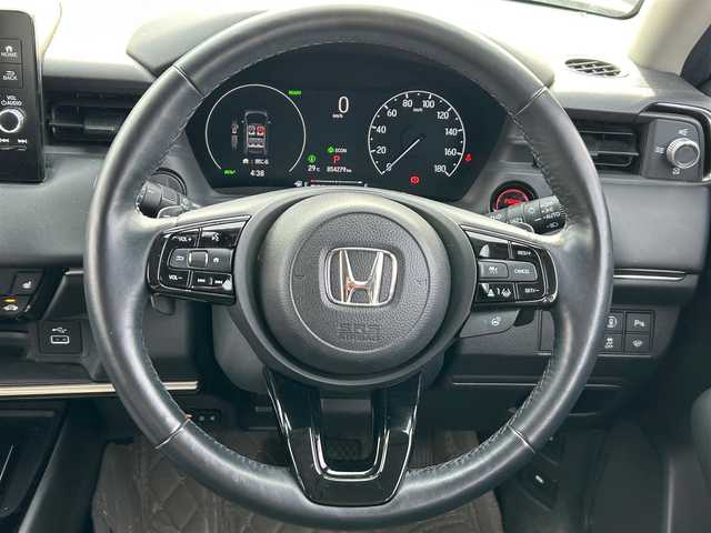ホンダ ヴェゼル ハイブリッド e:HEV Z 宮城県 2022(令4)年 5.5万km プラチナホワイトパール Honda CONNECTディスプレー/・9インチワイドディスプレイ/・ナビ機能/・Bluetooth/・フルセグTV/＋ETC2.0車載器＋ワイヤレス充電器/後退出庫サポート/＝＝＝/ホンダセンシング/・衝突軽減ブレーキ/・誤発進抑制機能/・後方誤発進抑制機能/・近距離衝突軽減ブレーキ/・歩行者事故軽減ステアリング/・路外逸脱抑制機能/・渋滞追従機能付アダプティブクルーズコントロール/・車線維持支援システム/・先行車発進お知らせ機能/・標識認識機能/・オートハイビーム/・パーキングセンサーシステム/ブラインドスポットインフォメーション/ハンズフリーアクセスパワーテールゲート(予約クローズ機能付)/ハーフレザーシート/親水/ヒーテッドドアミラー/＋熱線入りフロントウインドウ/＋運転席助手席シートヒーター/LEDヘッドランプ/LEDシーケンシャルターンランプ/フォグランプ/電動パーキングブレーキ/ブレーキホールド/スマートキー＆プッシュスタート/純正18インチAW/フロアマット/ドアバイザー/W/サイド/カーテンエアバッグ