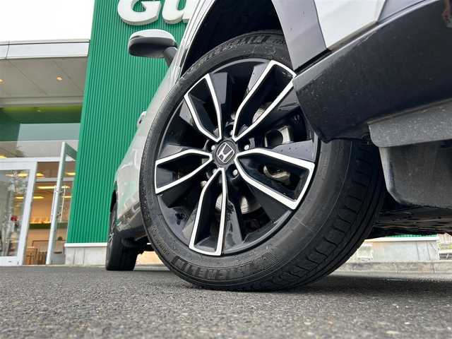 ホンダ ヴェゼル ハイブリッド e:HEV Z 宮城県 2022(令4)年 5.5万km プラチナホワイトパール Honda CONNECTディスプレー/・9インチワイドディスプレイ/・ナビ機能/・Bluetooth/・フルセグTV/＋ETC2.0車載器＋ワイヤレス充電器/後退出庫サポート/＝＝＝/ホンダセンシング/・衝突軽減ブレーキ/・誤発進抑制機能/・後方誤発進抑制機能/・近距離衝突軽減ブレーキ/・歩行者事故軽減ステアリング/・路外逸脱抑制機能/・渋滞追従機能付アダプティブクルーズコントロール/・車線維持支援システム/・先行車発進お知らせ機能/・標識認識機能/・オートハイビーム/・パーキングセンサーシステム/ブラインドスポットインフォメーション/ハンズフリーアクセスパワーテールゲート(予約クローズ機能付)/ハーフレザーシート/親水/ヒーテッドドアミラー/＋熱線入りフロントウインドウ/＋運転席助手席シートヒーター/LEDヘッドランプ/LEDシーケンシャルターンランプ/フォグランプ/電動パーキングブレーキ/ブレーキホールド/スマートキー＆プッシュスタート/純正18インチAW/フロアマット/ドアバイザー/W/サイド/カーテンエアバッグ