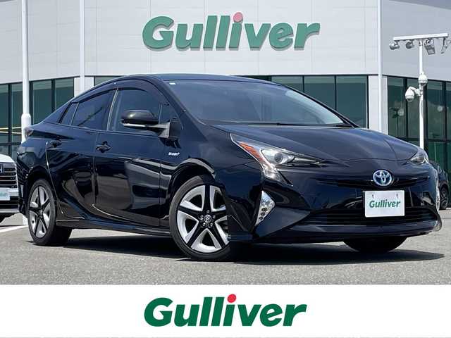 トヨタ プリウス S ツーリングセレクション 佐賀県 2017(平29)年 8.4万km アティチュードブラックマイカ 純正9型ナビゲーション「DSZT-YC4T」/・AM/FM/BT/CD/DVD/フルセグ/・バックカメラ/黒合皮シート/・前席シートヒーター/プッシュスタート/スマートキー/ETC/横滑り防止装置/LEDヘッドライト/純正フォグライト/純正17インチアルミホイール/純正フロアマット/純正ドアバイザー/スペアキー1本