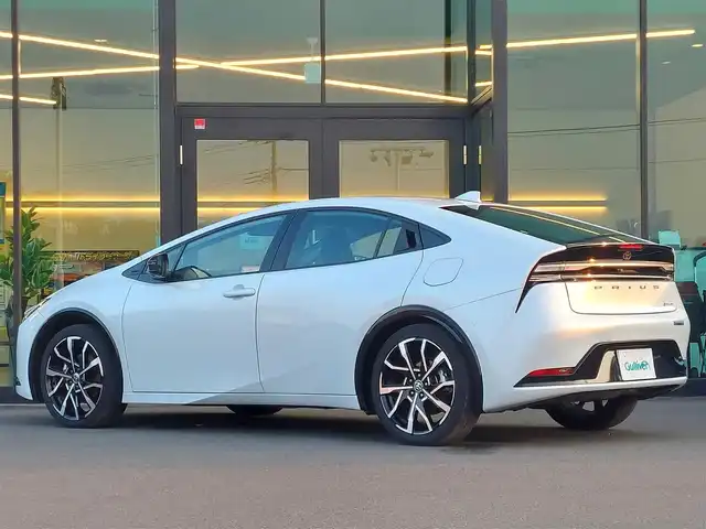 トヨタ プリウス Z 東京都 2023(令5)年 1.2万km プラチナホワイトパールマイカ 純正12.3インチディスプレイオーディオ/パノラミックビューモニター/ビルトインETC2.0/フルセグ/トヨタチームメイト/デジタルインナーミラー/AC100V/パワーバックドア/シートヒーター/ベンチレーションシート/Toyota Safety Sense/プリクラッシュセーフティ/レーントレーシングアシスト/レーダークルーズコントロール/ブラインドスポットモニター/アダプティブクルーズコントロール/オートマチックハイビーム