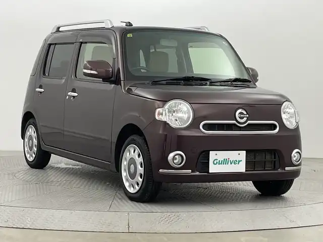 ダイハツ ミラ ココア プラスG 新潟県 2014(平26)年 5万km プラムブラウンクリスタルマイカ 4WD/純正ナビ/　　ワンセグ/CD/FM/AM/AUX/バックカメラ/Fフォグ/アイドリングストップ/ウィンカーミラー/電格ミラー/オートエアコン/社外アルミホイール付スタッドレスタイヤ車載/スマートキー