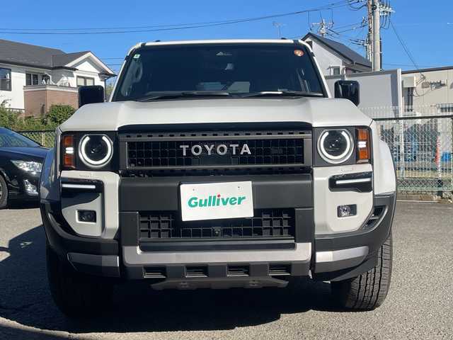 トヨタ ランドクルーザー ２５０ VX ファーストエディション 神奈川県 2024(令6)年 0.6万km プラチナホワイトパールマイカ ワンオーナー/プッシュスタート/ビルトインETC2.0/レーダークルーズコントロール/シートヒーター、クーラー/ステアリングヒーター/横滑り防止装置/パワーバックドア/オートライト、ハイビーム/パドルシフト/コーナーセンサー/サンルーフ/電動格納ミラー/デジタルルームミラー/デフロック/全方位カメラ/パワーシート/LEDライト、フォグ/社外セキュリティ（AUTHOR）/USB-C端子/HDMI端子