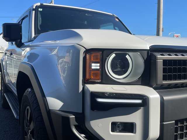 トヨタ ランドクルーザー ２５０ VX ファーストエディション 神奈川県 2024(令6)年 0.6万km プラチナホワイトパールマイカ ワンオーナー/プッシュスタート/ビルトインETC2.0/レーダークルーズコントロール/シートヒーター、クーラー/ステアリングヒーター/横滑り防止装置/パワーバックドア/オートライト、ハイビーム/パドルシフト/コーナーセンサー/サンルーフ/電動格納ミラー/デジタルルームミラー/デフロック/全方位カメラ/パワーシート/LEDライト、フォグ/社外セキュリティ（AUTHOR）/USB-C端子/HDMI端子