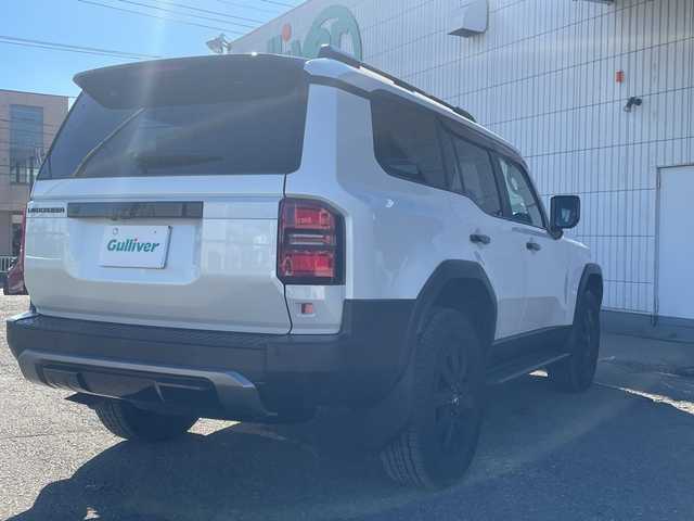 トヨタ ランドクルーザー ２５０ VX ファーストエディション 神奈川県 2024(令6)年 0.6万km プラチナホワイトパールマイカ ワンオーナー/プッシュスタート/ビルトインETC2.0/レーダークルーズコントロール/シートヒーター、クーラー/ステアリングヒーター/横滑り防止装置/パワーバックドア/オートライト、ハイビーム/パドルシフト/コーナーセンサー/サンルーフ/電動格納ミラー/デジタルルームミラー/デフロック/全方位カメラ/パワーシート/LEDライト、フォグ/社外セキュリティ（AUTHOR）/USB-C端子/HDMI端子