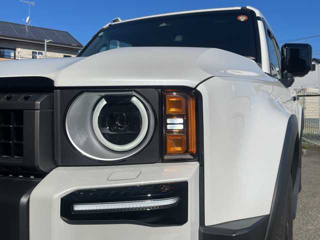 トヨタ ランドクルーザー ２５０ VX ファーストエディション 神奈川県 2024(令6)年 0.6万km プラチナホワイトパールマイカ ワンオーナー/プッシュスタート/ビルトインETC2.0/レーダークルーズコントロール/シートヒーター、クーラー/ステアリングヒーター/横滑り防止装置/パワーバックドア/オートライト、ハイビーム/パドルシフト/コーナーセンサー/サンルーフ/電動格納ミラー/デジタルルームミラー/デフロック/全方位カメラ/パワーシート/LEDライト、フォグ/社外セキュリティ（AUTHOR）/USB-C端子/HDMI端子