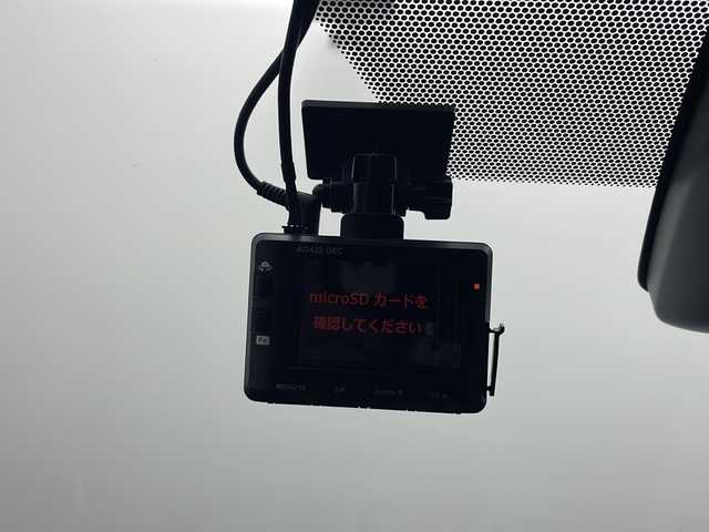 トヨタ ヴォクシー ZS 煌Ⅲ 秋田県 2021(令3)年 4.8万km ホワイトパールクリスタルシャイン 4WD/純正SDナビ　/両側パワースライドドア　/フリップダウンモニター　/フルセグTV/AM/FM/CD/バックカメラ　/衝突被害軽減ブレーキ　/クルーズコントロール　/レーンキープアシスト　/横滑り防止装置/前後コーナーセンサー/アイドリングストップ/ビルトインETC　/前後ドライブレコーダー　/LEDヘッドライト/オートマチックハイビーム/LEDフォグランプ/サイドバイザー/革巻きステアリング/純正アルミホイール/リアサンシェード