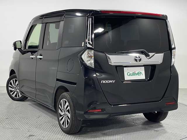 トヨタ ルーミー カスタムG 広島県 2022(令4)年 2.9万km ブラックマイカメタリック 禁煙/パノラミックビューモニター/純正9型ディスプレイオーディオ/両側パワースライドドア/レーダークルーズコントロール/衝突軽減ブレーキ/車線逸脱警報/オートハイビーム/誤発進抑制/前後コーナーセンサー/純正アルミホイール/LEDヘッドライト/オートライト/ETC/スマートキー