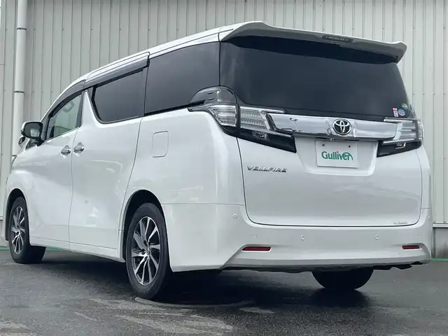 トヨタ ヴェルファイア V 富山県 2016(平28)年 4.9万km ホワイトパールクリスタルシャイン 〇純正10インチナビ/〇フルセグTV/〇バックカメラ/〇フリップダウンモニター/〇ビルトインETC/〇ドライブレコーダー/〇パワースライドドア（両側）/○コーナーセンサー/〇パワーバックドア/〇LEDヘッドランプ/〇オートライト/〇フォグランプ/〇純正17インチアルミ/〇ハーフレザーシート/〇パワーシート/〇革巻きステアリングホイール/〇前後左右独立オートエアコン/〇スマートエントリー/〇禁煙車