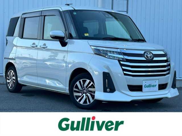 トヨタ ルーミー カスタムG 愛媛県 2021(令3)年 1.7万km パールホワイトⅢ 純正SDメモリーナビ/全方位カメラ/フルセグTV/CD/DVD再生/ETC/ミュージックサーバー（SD録音）/Bluetooth接続/アダプティブクルーズコントロール/両側パワースライドドア/純正フロアマット/純正14インチアルミホイール/LEDヘッドライト/コーナーセンサー/横滑り防止装置/衝突軽減ブレーキ/電動パーキングブレーキ/ブレーキホールド/ドライブレコーダー/充電用USBポート