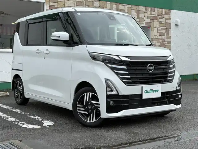 日産 ルークス HWS X プロパイロットED 徳島県 2024(令6)年 1.3万km ホワイトパール 純正ナビ　MM223D-Le/(AM/FM/BT/HDMI/SD/フルセグ)/バックカメラ/全周囲カメラ/ETC/両側電動スライドドア/追従式クルーズコントロール/ドライブレコーダー/インテリジェントルームミラー/コーナーセンサー/LEDヘッドライト/リヤシーリングファン/アイドリングストップ/オートライト/純正フロアマット/プロパイロット/エマージェンシーブレーキ/オートブレーキホールド/ドアバイザー/プッシュスタート/新車時保証書