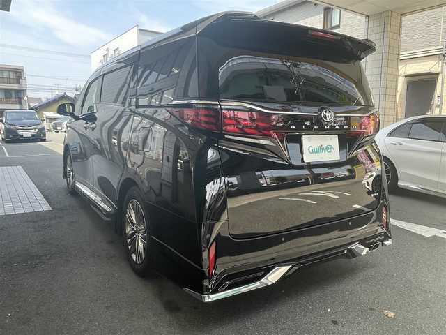 トヨタ アルファードハイブリット Z 愛知県 2024(令6)年 0.9万km ブラック ワンオーナー/モデリスタエアロキット/・フロント／サイド／リアアンダー／ドレスアップマフラー/黒合皮シート/前席2列目シートヒーター＆ベンチレーション/前席パワーシート/2列目エグゼクティブパワーシート/両側パワースライドドア/純正14型ディスプレイオーディオ/・車載ナビ／地デジTV／USB／HDMI/・Apple Car Play／Android Auto/パノラミックビューモニター〈床下透過表示機能〉/純正13.2型有機ELフリップダウンモニター/デジタルインナーミラー/ビルトインETC2.0/ワイヤレス充電/3眼LEDヘッドライト/純正18インチAW/TOYOTA SAFETY SENSE/・プリクラッシュセーフティ/・レーントレーシングアシスト/・レーンディパーチャーアラート/・全車速追従機能付レーダークルーズコントロール/・アダプティブハイビームシステム/・先行車発進告知/・プロアクティブドライビングアシスト/ブラインドスポットモニター/パーキングサポートブレーキ/スマートキー