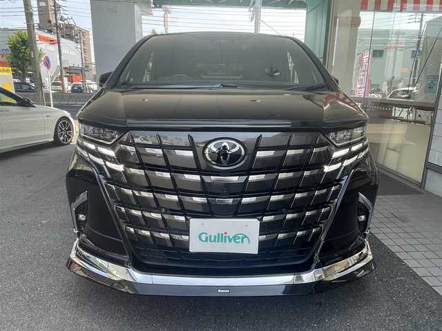 トヨタ アルファードハイブリット Z 愛知県 2024(令6)年 0.9万km ブラック ワンオーナー/モデリスタエアロキット/・フロント／サイド／リアアンダー／ドレスアップマフラー/黒合皮シート/前席2列目シートヒーター＆ベンチレーション/前席パワーシート/2列目エグゼクティブパワーシート/両側パワースライドドア/純正14型ディスプレイオーディオ/・車載ナビ／地デジTV／USB／HDMI/・Apple Car Play／Android Auto/パノラミックビューモニター〈床下透過表示機能〉/純正13.2型有機ELフリップダウンモニター/デジタルインナーミラー/ビルトインETC2.0/ワイヤレス充電/3眼LEDヘッドライト/純正18インチAW/TOYOTA SAFETY SENSE/・プリクラッシュセーフティ/・レーントレーシングアシスト/・レーンディパーチャーアラート/・全車速追従機能付レーダークルーズコントロール/・アダプティブハイビームシステム/・先行車発進告知/・プロアクティブドライビングアシスト/ブラインドスポットモニター/パーキングサポートブレーキ/スマートキー