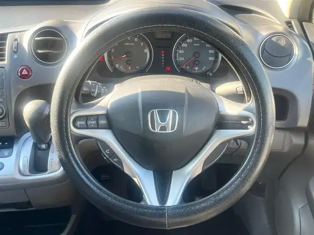ホンダ ストリーム X HDDナビパッケージ 島根県 2010(平22)年 14万km プレミアムホワイトパール 純正ナビ　/地デジ/ＤＶＤ再生/ＡＭ／ＦＭラジオ/バックカメラ/純正キセノンヘッドライト/純正フロアマット/ステアリングオーディオスイッチ　