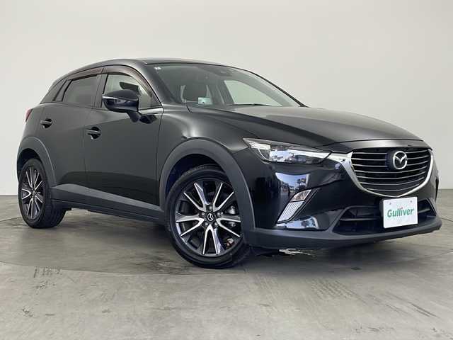 マツダ ＣＸ－３ 20S プロアクティブ 兵庫県 2018(平30)年 5万km ジェットブラックマイカ ・純正ナビ/Bluetooth/CD/DVD/TV/・バックカメラ/・ETC/・前方ドライブレコーダー/・前後コーナーセンサー/・ヘッドアップディスプレイ/・ハーフレザーシート/・メモリシート（D席）/・パワーシート（D席）/・シートヒーター（D席＋N席）/・革巻きステアリング/・ステアリングリモコン/・ステアリングヒーター/・パドルシフト/・MTモード付AT/・横滑り防止装置/・盗難防止装置/・衝突被害軽減システム/・レーンキープアシスト/・ブラインドスポットモニター/・アイドリングストップ/・LEDオートライト/・オートマチックハイビーム/・純正18インチアルミホイール/・電動格納ミラー