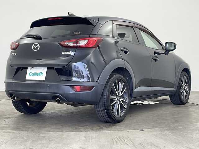 マツダ ＣＸ－３ 20S プロアクティブ 兵庫県 2018(平30)年 5万km ジェットブラックマイカ ・純正ナビ/Bluetooth/CD/DVD/TV/・バックカメラ/・ETC/・前方ドライブレコーダー/・前後コーナーセンサー/・ヘッドアップディスプレイ/・ハーフレザーシート/・メモリシート（D席）/・パワーシート（D席）/・シートヒーター（D席＋N席）/・革巻きステアリング/・ステアリングリモコン/・ステアリングヒーター/・パドルシフト/・MTモード付AT/・横滑り防止装置/・盗難防止装置/・衝突被害軽減システム/・レーンキープアシスト/・ブラインドスポットモニター/・アイドリングストップ/・LEDオートライト/・オートマチックハイビーム/・純正18インチアルミホイール/・電動格納ミラー