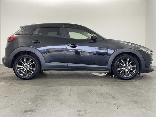 マツダ ＣＸ－３ 20S プロアクティブ 兵庫県 2018(平30)年 5万km ジェットブラックマイカ ・純正ナビ/Bluetooth/CD/DVD/TV/・バックカメラ/・ETC/・前方ドライブレコーダー/・前後コーナーセンサー/・ヘッドアップディスプレイ/・ハーフレザーシート/・メモリシート（D席）/・パワーシート（D席）/・シートヒーター（D席＋N席）/・革巻きステアリング/・ステアリングリモコン/・ステアリングヒーター/・パドルシフト/・MTモード付AT/・横滑り防止装置/・盗難防止装置/・衝突被害軽減システム/・レーンキープアシスト/・ブラインドスポットモニター/・アイドリングストップ/・LEDオートライト/・オートマチックハイビーム/・純正18インチアルミホイール/・電動格納ミラー