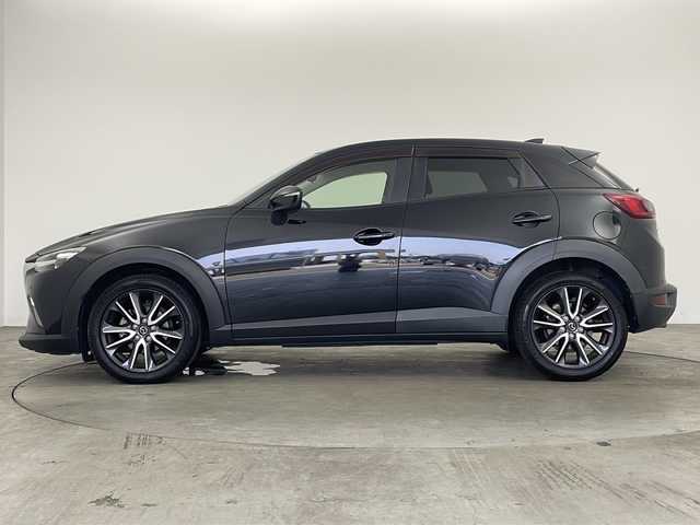 マツダ ＣＸ－３ 20S プロアクティブ 兵庫県 2018(平30)年 5万km ジェットブラックマイカ ・純正ナビ/Bluetooth/CD/DVD/TV/・バックカメラ/・ETC/・前方ドライブレコーダー/・前後コーナーセンサー/・ヘッドアップディスプレイ/・ハーフレザーシート/・メモリシート（D席）/・パワーシート（D席）/・シートヒーター（D席＋N席）/・革巻きステアリング/・ステアリングリモコン/・ステアリングヒーター/・パドルシフト/・MTモード付AT/・横滑り防止装置/・盗難防止装置/・衝突被害軽減システム/・レーンキープアシスト/・ブラインドスポットモニター/・アイドリングストップ/・LEDオートライト/・オートマチックハイビーム/・純正18インチアルミホイール/・電動格納ミラー