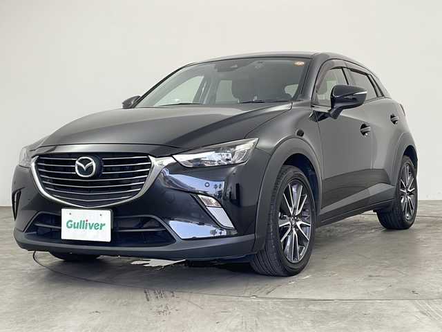 マツダ ＣＸ－３ 20S プロアクティブ 兵庫県 2018(平30)年 5万km ジェットブラックマイカ ・純正ナビ/Bluetooth/CD/DVD/TV/・バックカメラ/・ETC/・前方ドライブレコーダー/・前後コーナーセンサー/・ヘッドアップディスプレイ/・ハーフレザーシート/・メモリシート（D席）/・パワーシート（D席）/・シートヒーター（D席＋N席）/・革巻きステアリング/・ステアリングリモコン/・ステアリングヒーター/・パドルシフト/・MTモード付AT/・横滑り防止装置/・盗難防止装置/・衝突被害軽減システム/・レーンキープアシスト/・ブラインドスポットモニター/・アイドリングストップ/・LEDオートライト/・オートマチックハイビーム/・純正18インチアルミホイール/・電動格納ミラー