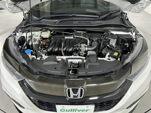 ホンダ ヴェゼル ハイブリッド RS ホンダセンシング 佐賀県 2018(平30)年 4.4万km プラチナホワイトパール 純正8型ナビ/CD/DVD/BT/フルセグTV/USB/HDMI/バックカメラ/ビルトインＥＴＣ/ハーフレザーシート/シートヒーター/パドルシフト/ドライブレコーダー/電動パーキング/ブレーキホールド/衝突軽減ブレーキ/レーダークルーズコントロール/レーンキープアシスト/スマートキー/スペアキー