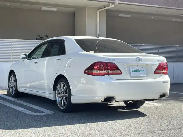 トヨタ クラウン アスリート 大阪府 2009(平21)年 7.6万km ホワイトパールクリスタルシャイン ワンオーナー/8インチＨＤＤ純正ナビ/・バックカメラ/・フルセグＴＶ/・ＣＤ/ＤＶＤ/・ＡＭ/ＦＭ/ブラウンレザーシート/・パワーシート（運転席メモリ付き/助手席）/・シートヒーター/エアーシート（運転席/助手席）/電動リアゲード/純正エアロパーツ（リアアンダー/スポイラー）/前方ドライブレコーダー（ＤＲＶ－６１０）/ビルトインＥＴＣ/純正18インチＡＷ/キセノンライト/・オートライト/Ｗ+サイドＳＲＳエアバッグ/カーテンエアバッグ/保証書/取扱説明書/スペアキー1本