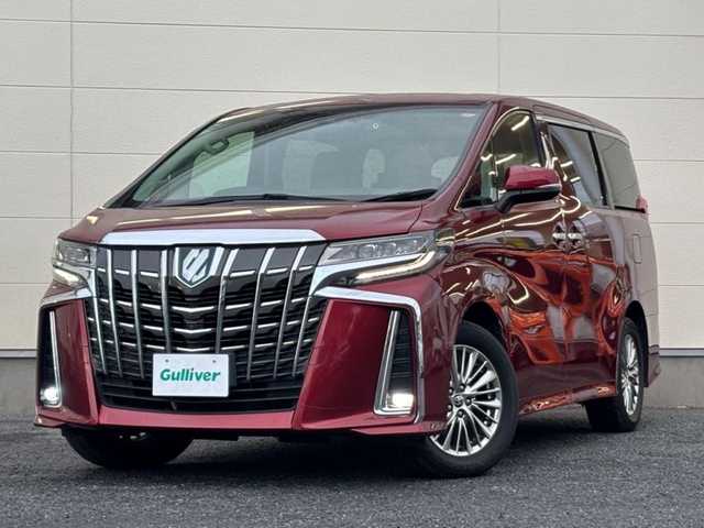 トヨタ アルファードハイブリット SR Cパッケージ 茨城県 2022(令4)年 7.1万km ワイン 純正ナビ/パノラミックビューモニター/フリップダウンモニター/デジタルインナーミラー/前後ドライブレコーダー/両側パワースライドドア/JBLプレミアムサウンド/2.0ビルトインETC/AC100V/オットマン/ステアリングヒーター/シートヒーターD席＋N席/エアーシート