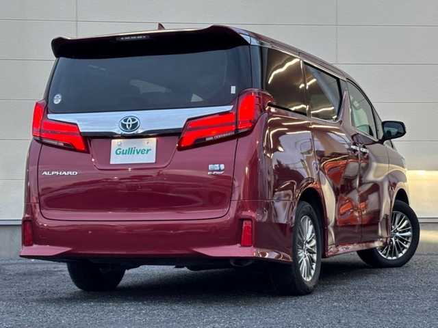 トヨタ アルファードハイブリット SR Cパッケージ 茨城県 2022(令4)年 7.1万km ワイン 純正ナビ/パノラミックビューモニター/フリップダウンモニター/デジタルインナーミラー/前後ドライブレコーダー/両側パワースライドドア/JBLプレミアムサウンド/2.0ビルトインETC/AC100V/オットマン/ステアリングヒーター/シートヒーターD席＋N席/エアーシート