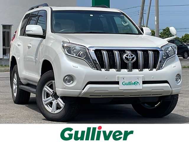 トヨタ ランドクルーザー プラド TX 道央・札幌 2016(平28)年 5.1万km ホワイトパールクリスタルシャイン ４WD/寒冷地仕様/サンルーフ/純正ディーラーOPナビ/CD/DVD/BT/フルセグ/横滑り防止装置/クルーズコントロール/バックカメラ/ビルトインETC/ドライブレコーダー/ワイパーデアイサー/トランスファ切替/ステアリングリモコン/MTモード付AT/プッシュスタート/スマートキー/LEDヘッドライト/オートライト/フォグランプ/ヘッドライトウォッシャー/電動格納ミラー/ウィンカーミラー/純正フロアマット/ドアバイザー/スペアキー/純正エンジンスターター/純正AW付夏タイヤ積込/265/65/R17/2017年/山6mm