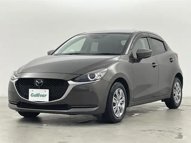 マツダ マツダ２ 15S プロアクティブ 群馬県 2021(令3)年 1.4万km チタニウムフラッシュマイカ マツダコネクトナビ/　CD/DVDプレイヤー+地上TVチューナー（フルセグ）/　Bluetooth/USB/SD/===========================/スマート・ブレーキ・サポート/マツダレーダークルーズコントロール/［全車速追従機能付］＊停車保持機能なし/レーンキープアシストシステム/アダプティブＬＥＤヘッドライト/３６０°ビュー・モニター＋フロントパーキングセンサー/（センター／コーナー）/ヘッドランプユニット内シグネチャーＬＥＤランプ/ステアリングスイッチパネル加飾（サテンクロームメッキ）/シャークフィンアンテナ（ラジオ用）/前後コーナーセンサー/前方ドライブレコーダー/ETC/前席シートヒーター/スペアキー