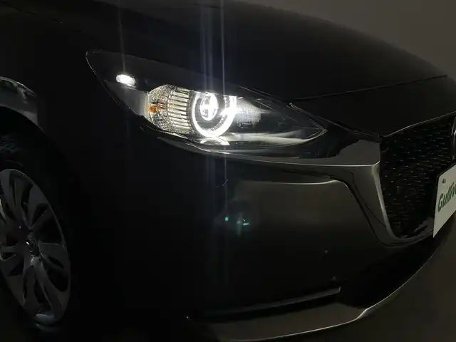 マツダ マツダ２ 15S プロアクティブ 群馬県 2021(令3)年 1.4万km チタニウムフラッシュマイカ マツダコネクトナビ/　CD/DVDプレイヤー+地上TVチューナー（フルセグ）/　Bluetooth/USB/SD/===========================/スマート・ブレーキ・サポート/マツダレーダークルーズコントロール/［全車速追従機能付］＊停車保持機能なし/レーンキープアシストシステム/アダプティブＬＥＤヘッドライト/３６０°ビュー・モニター＋フロントパーキングセンサー/（センター／コーナー）/ヘッドランプユニット内シグネチャーＬＥＤランプ/ステアリングスイッチパネル加飾（サテンクロームメッキ）/シャークフィンアンテナ（ラジオ用）/前後コーナーセンサー/前方ドライブレコーダー/ETC/前席シートヒーター/スペアキー
