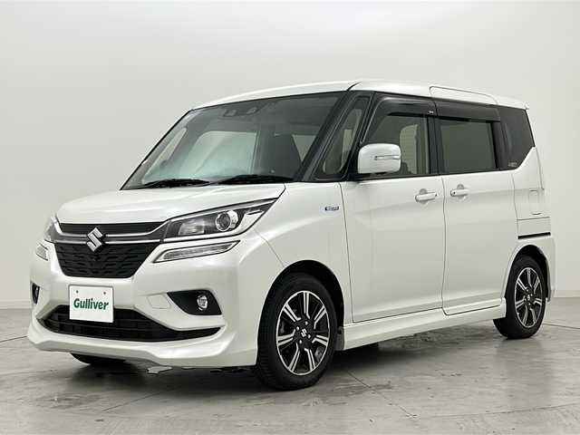 スズキ ソリオ バンディット HV MV 宮城県 2018(平30)年 3.4万km ピュアホワイトP スズキセーフティサポート	/・車線逸脱抑制制御機能	/・車線逸脱警報機能	/・パーキングソナー	/・横滑り防止装置/・ハイビームアシスト	/デュアルカメラブレーキ/全方位カメラ/両側パワースライドドア/純正8型ナビ/・SD.DVD.CD.BT/フルセグTV/運転席シートヒーター/パドルシフト/ステアリングスイッチ/ビルトインETC/ドライブレコーダー（F）/LEDヘッドライト/LEDフォグランプ/アイドリングストップ/横滑り防止装置/純正15inAW/純正フロアマット/後席ロールサンシェード/シートバックテーブル
