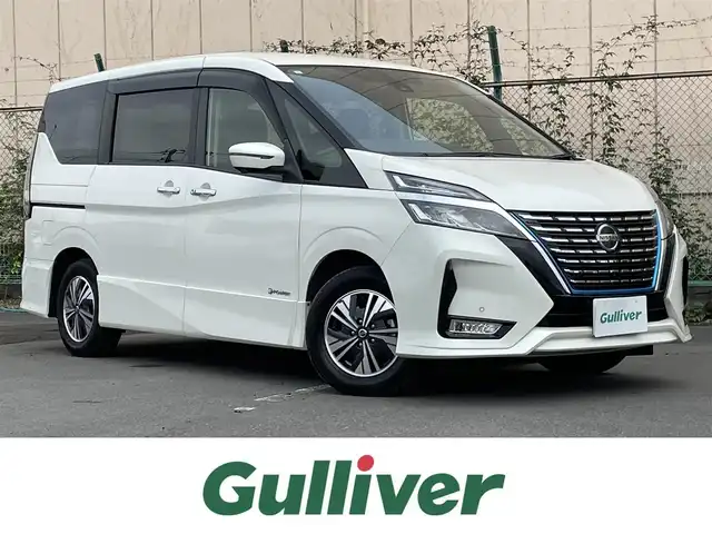 日産 セレナ e－パワー ハイウェイスター V 東京都 2021(令3)年 7万km ブリリアントホワイトパール 純正10インチナビ/(DVD/CD/フルセグTV/Bluetooth/SD)/後席用モニター/アラウンドビューモニター/インテリジェントルームミラー/両側パワースライドドア/プロパイロット/ブラインドスポットモニター/エマージェンシーブレーキサポート/車線逸脱警報/前後コーナーセンサー/ＥＴＣ/LED/オートライト/スマートキー