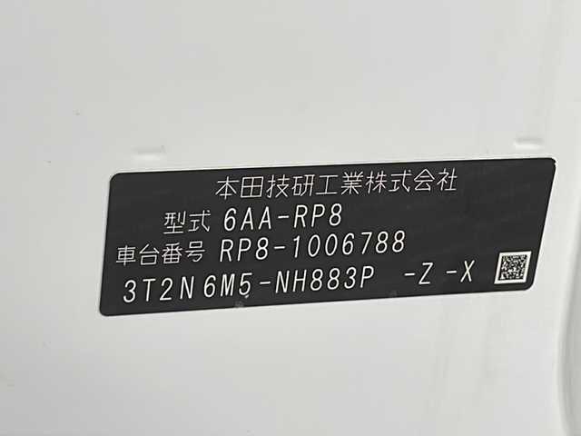ホンダ ステップワゴン スパーダ eHEV 沖縄県 2022(令4)年 2.1万km プラチナホワイトパール 純正11.4インチナビ(LXM-237VFLi)/（フルセグTV　DVD　Bluetooth接続）/バックカメラ/純正15.6インチフリップダウンモニター/ETC/ドライブレコーダー/ステアリングスイッチ/クルーズコントロール/パドルシフト/両側パワースライドドア/ハーフレザーシート/シートヒーター/パワーバックドア/クリアランスソナー/LEDヘッドライト/オートライト/スマートキー/スペアキー/プッシュスタート/純正フロアマット/純正16インチアルミホイール/保証書/取扱説明書
