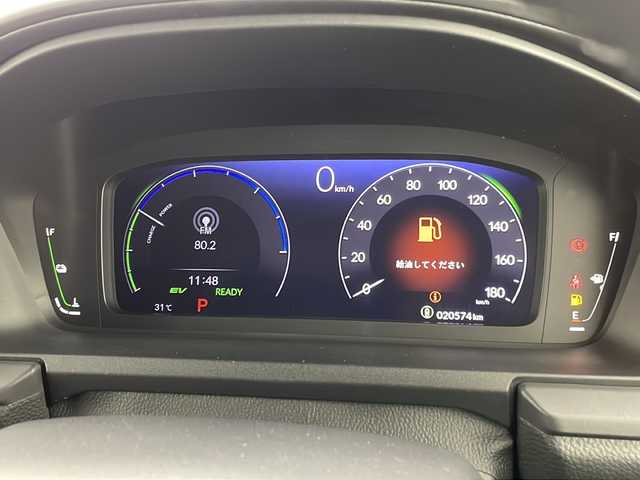 ホンダ ステップワゴン スパーダ eHEV 沖縄県 2022(令4)年 2.1万km プラチナホワイトパール 純正11.4インチナビ(LXM-237VFLi)/（フルセグTV　DVD　Bluetooth接続）/バックカメラ/純正15.6インチフリップダウンモニター/ETC/ドライブレコーダー/ステアリングスイッチ/クルーズコントロール/パドルシフト/両側パワースライドドア/ハーフレザーシート/シートヒーター/パワーバックドア/クリアランスソナー/LEDヘッドライト/オートライト/スマートキー/スペアキー/プッシュスタート/純正フロアマット/純正16インチアルミホイール/保証書/取扱説明書
