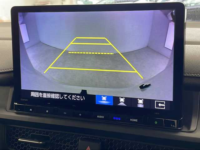 ホンダ ステップワゴン スパーダ eHEV 沖縄県 2022(令4)年 2.1万km プラチナホワイトパール 純正11.4インチナビ(LXM-237VFLi)/（フルセグTV　DVD　Bluetooth接続）/バックカメラ/純正15.6インチフリップダウンモニター/ETC/ドライブレコーダー/ステアリングスイッチ/クルーズコントロール/パドルシフト/両側パワースライドドア/ハーフレザーシート/シートヒーター/パワーバックドア/クリアランスソナー/LEDヘッドライト/オートライト/スマートキー/スペアキー/プッシュスタート/純正フロアマット/純正16インチアルミホイール/保証書/取扱説明書