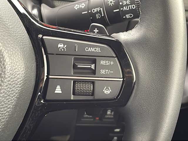 ホンダ ステップワゴン スパーダ eHEV 沖縄県 2022(令4)年 2.1万km プラチナホワイトパール 純正11.4インチナビ(LXM-237VFLi)/（フルセグTV　DVD　Bluetooth接続）/バックカメラ/純正15.6インチフリップダウンモニター/ETC/ドライブレコーダー/ステアリングスイッチ/クルーズコントロール/パドルシフト/両側パワースライドドア/ハーフレザーシート/シートヒーター/パワーバックドア/クリアランスソナー/LEDヘッドライト/オートライト/スマートキー/スペアキー/プッシュスタート/純正フロアマット/純正16インチアルミホイール/保証書/取扱説明書