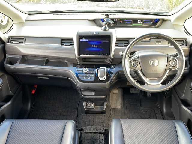 ホンダ フリード ハイブリット G ホンダセンシング 青森県 2019(令1)年 9.1万km クリスタルブラックパール ・4WD/・純正ギャザーズナビ/・フリップダウンモニター/・Bluetooth/フルセグ/・バックカメラ/・純正エンジンスターター/・両側パワースライドドア/・衝突軽減ブレーキ/・レーダークルーズコントロール/・レーンキープアシスト/・プッシュスタート/・スマートキー/・シートヒーター/・オートライト/・純正15AW/・スペアキー有/・保証書・取説あり