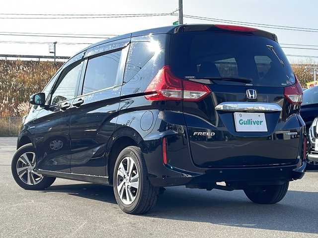 ホンダ フリード ハイブリット G ホンダセンシング 青森県 2019(令1)年 9.1万km クリスタルブラックパール ・4WD/・純正ギャザーズナビ/・フリップダウンモニター/・Bluetooth/フルセグ/・バックカメラ/・純正エンジンスターター/・両側パワースライドドア/・衝突軽減ブレーキ/・レーダークルーズコントロール/・レーンキープアシスト/・プッシュスタート/・スマートキー/・シートヒーター/・オートライト/・純正15AW/・スペアキー有/・保証書・取説あり