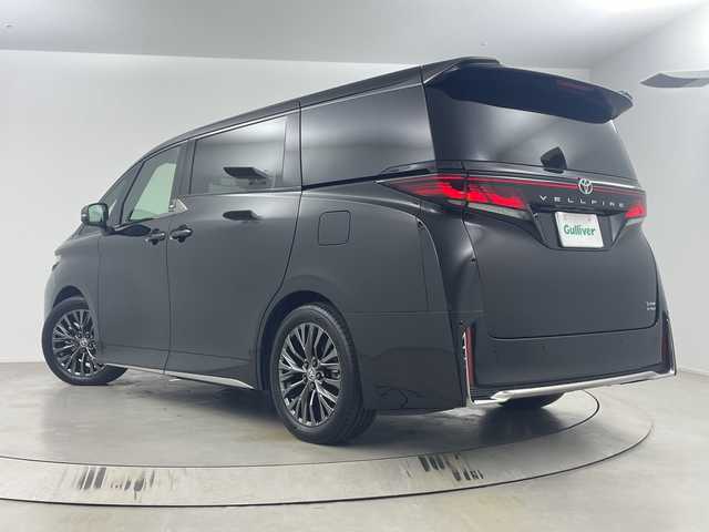 トヨタ ヴェルファイア ハイブリット Z プレミア 埼玉県 2025(令7)年 0.8万km ブラック 左右独立ムーンルーフ　/ユニバーサルステップ　/フリップダウンモニター　/純正ディスプレイオーディオ/　(FM/AM/TV/BT/USB)　/ＥＴＣ２．０　/パワーバックドア　/デジタルインナーミラー　/ブラインドスポットモニター　/コーナーセンサー　/レーダークルーズコントロール/ロードサインアシスト/安心降車アシスト/両側パワースライドドア/全席パワーシート/エアシート/シートヒーター/メモリーシート/ワイヤレス充電/パドルシフト/コンビハンドル/純正フロアマット