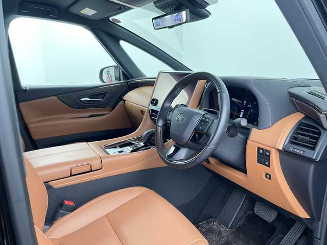 トヨタ ヴェルファイア ハイブリット Z プレミア 埼玉県 2025(令7)年 0.8万km ブラック 左右独立ムーンルーフ　/ユニバーサルステップ　/フリップダウンモニター　/純正ディスプレイオーディオ/　(FM/AM/TV/BT/USB)　/ＥＴＣ２．０　/パワーバックドア　/デジタルインナーミラー　/ブラインドスポットモニター　/コーナーセンサー　/レーダークルーズコントロール/ロードサインアシスト/安心降車アシスト/両側パワースライドドア/全席パワーシート/エアシート/シートヒーター/メモリーシート/ワイヤレス充電/パドルシフト/コンビハンドル/純正フロアマット